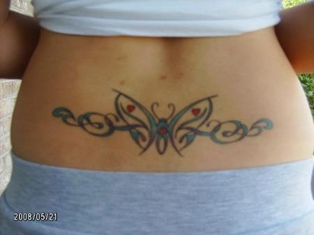 Lower back tribal butterfly tattoo 2 girl girl tribal tattoos