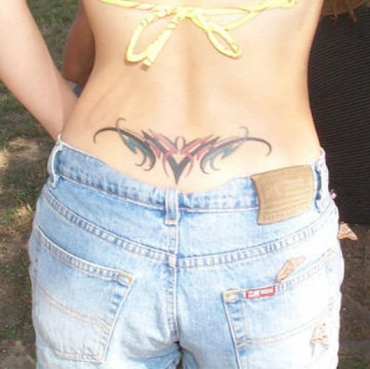 tattoos for the back. 2011 gabrielle anwar tattoos on her ack Last Name tattoos on the ack. large